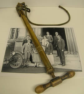 students and staff and car pump c.1924