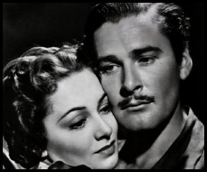 020_errol_flyn_olivia_de_haviland_theredlist~2