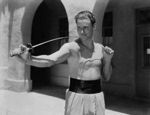 Errol with bended sword and necklaces
